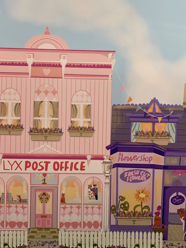 Ein Bild vom Stand des LYX Verlages auf der Frankfurter Buchmesse. Darauf sieht man das Post Office und den Flowershop, der imaginären Stadt LXYville, welche das Motto des Verlages auf der Messe war.